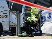 Israeli first responders are working at the site of a stabbing at the checkpoint outside of Jerusalem, Israel, on August 6, 2024, following...