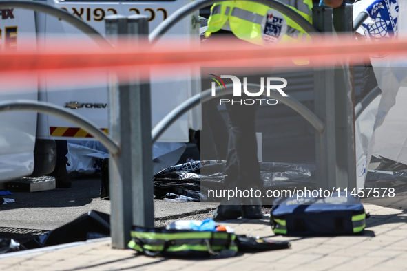 Israeli first responders are working at the site of a stabbing at the checkpoint outside of Jerusalem, Israel, on August 6, 2024, following...