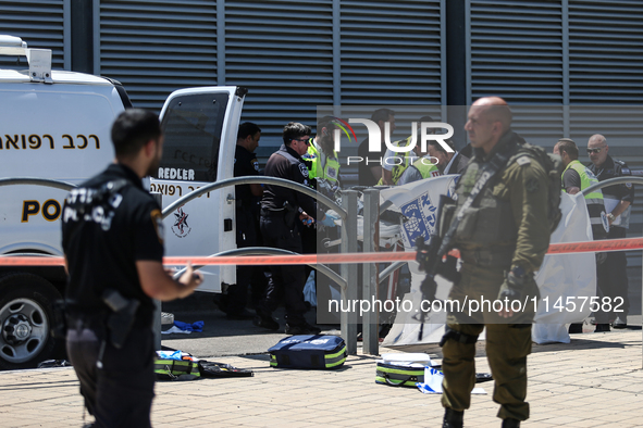 Israeli first responders are working at the site of a stabbing at the checkpoint outside of Jerusalem, Israel, on August 6, 2024, following...