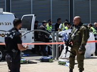 Israeli first responders are working at the site of a stabbing at the checkpoint outside of Jerusalem, Israel, on August 6, 2024, following...