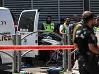 Israeli first responders are working at the site of a stabbing at the checkpoint outside of Jerusalem, Israel, on August 6, 2024, following...