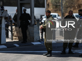 Israeli first responders are working at the site of a stabbing at the checkpoint outside of Jerusalem, Israel, on August 6, 2024, following...