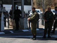 Israeli first responders are working at the site of a stabbing at the checkpoint outside of Jerusalem, Israel, on August 6, 2024, following...