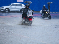 Vehicles are wading through the flooded streets of Kathmandu, Nepal, on August 6, 2024. Nepal's Meteorological Forecasting Division (MFD) un...