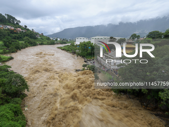 The Bagmati River is flooding in Chovar, Kathmandu, Nepal, on August 6, 2024. Nepal's Meteorological Forecasting Division (MFD) under the De...