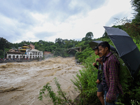 People are watching the flooded Bagmati River at Chovar in Kathmandu, Nepal, on August 6, 2024. Nepal's Meteorological Forecasting Division...