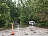 Tropical Storm Debby dropped inches of rain in Charleston, SC, causing businesses to close and prepare for flooding on August 6, 2024. (