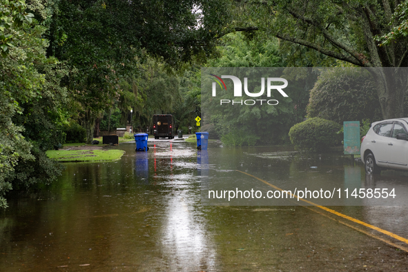 Tropical Storm Debby dropped inches of rain in Charleston, SC, causing businesses to close and prepare for flooding on August 6, 2024. 