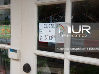 Tropical Storm Debby dropped inches of rain in Charleston, SC, causing businesses to close and prepare for flooding on August 6, 2024. (