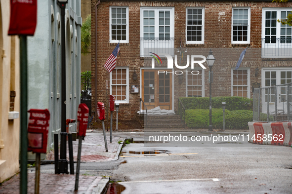 Tropical Storm Debby dropped inches of rain in Charleston, SC, causing businesses to close and prepare for flooding on August 6, 2024. 