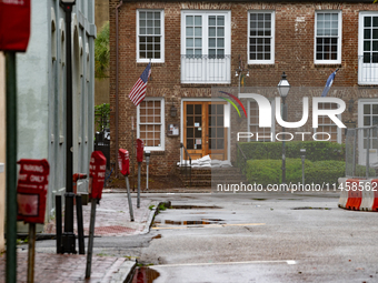 Tropical Storm Debby dropped inches of rain in Charleston, SC, causing businesses to close and prepare for flooding on August 6, 2024. (