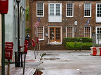 Tropical Storm Debby dropped inches of rain in Charleston, SC, causing businesses to close and prepare for flooding on August 6, 2024. (