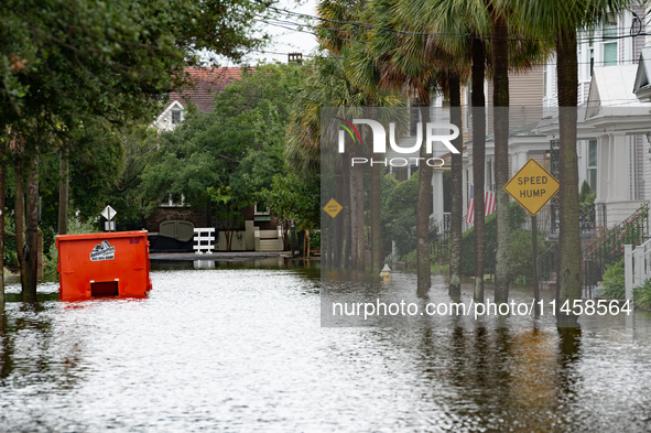 Tropical Storm Debby dropped inches of rain in Charleston, SC, causing businesses to close and prepare for flooding on August 6, 2024. 