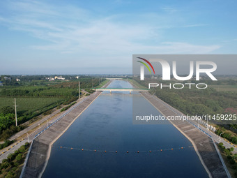 The Tanzhai Village section of the first phase of the Middle Route of the South-to-North Water Diversion Project is being viewed in Nanyang,...