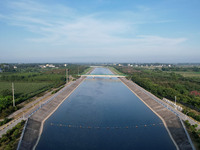 The Tanzhai Village section of the first phase of the Middle Route of the South-to-North Water Diversion Project is being viewed in Nanyang,...