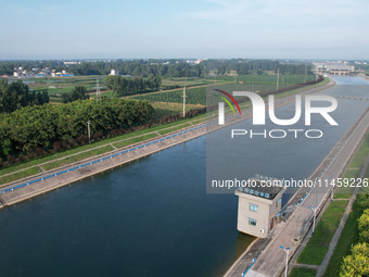 The Tanzhai Village section of the first phase of the Middle Route of the South-to-North Water Diversion Project is being viewed in Nanyang,...