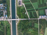 The Tanzhai Village section of the first phase of the Middle Route of the South-to-North Water Diversion Project is being viewed in Nanyang,...