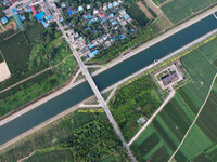 The Tanzhai Village section of the first phase of the Middle Route of the South-to-North Water Diversion Project is being viewed in Nanyang,...