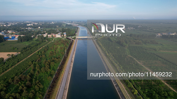 The Tanzhai Village section of the first phase of the Middle Route of the South-to-North Water Diversion Project is being viewed in Nanyang,...