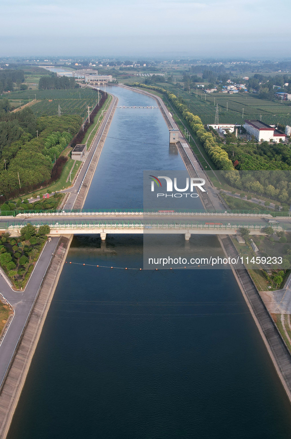 The Tanzhai Village section of the first phase of the Middle Route of the South-to-North Water Diversion Project is being viewed in Nanyang,...