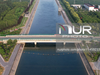 The Tanzhai Village section of the first phase of the Middle Route of the South-to-North Water Diversion Project is being viewed in Nanyang,...