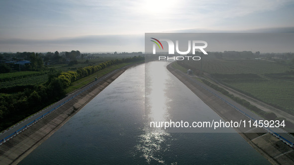 The Tanzhai Village section of the first phase of the Middle Route of the South-to-North Water Diversion Project is being viewed in Nanyang,...