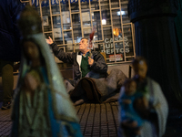 Pilgrims are waiting to enter the church of San Cayetano in Liniers, a working-class neighborhood of Buenos Aires, Argentina, on August 6, 2...