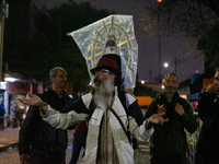 Pilgrims are waiting to enter the church of San Cayetano in Liniers, a working-class neighborhood of Buenos Aires, Argentina, on August 6, 2...