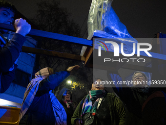 Pilgrims are waiting to enter the church of San Cayetano in Liniers, a working-class neighborhood of Buenos Aires, Argentina, on August 6, 2...