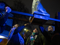 Pilgrims are waiting to enter the church of San Cayetano in Liniers, a working-class neighborhood of Buenos Aires, Argentina, on August 6, 2...