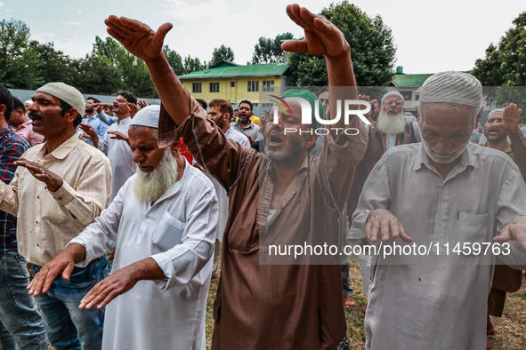 Muslim devotees are taking part in Salatul Istisqa in Sopore, Jammu and Kashmir, India, on August 7, 2024, to pray for an end to the dry hot...