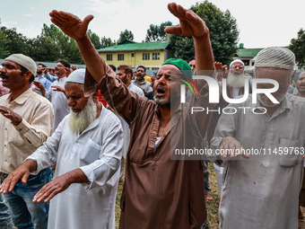 Muslim devotees are taking part in Salatul Istisqa in Sopore, Jammu and Kashmir, India, on August 7, 2024, to pray for an end to the dry hot...