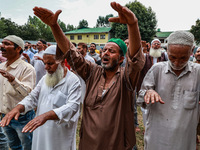 Muslim devotees are taking part in Salatul Istisqa in Sopore, Jammu and Kashmir, India, on August 7, 2024, to pray for an end to the dry hot...