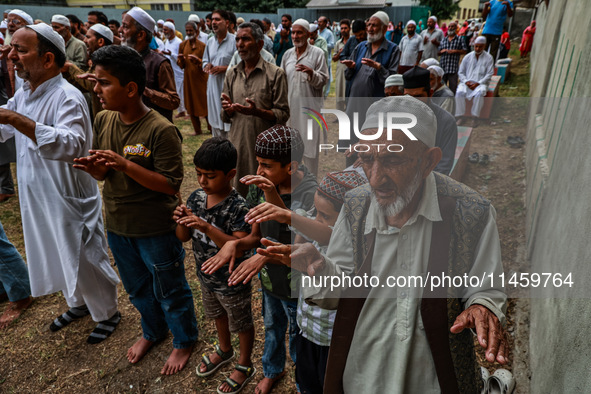 Muslim devotees are taking part in Salatul Istisqa in Sopore, Jammu and Kashmir, India, on August 7, 2024, to pray for an end to the dry hot...