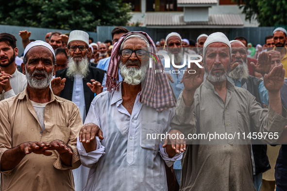 Muslim devotees are taking part in Salatul Istisqa in Sopore, Jammu and Kashmir, India, on August 7, 2024, to pray for an end to the dry hot...