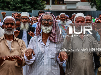 Muslim devotees are taking part in Salatul Istisqa in Sopore, Jammu and Kashmir, India, on August 7, 2024, to pray for an end to the dry hot...