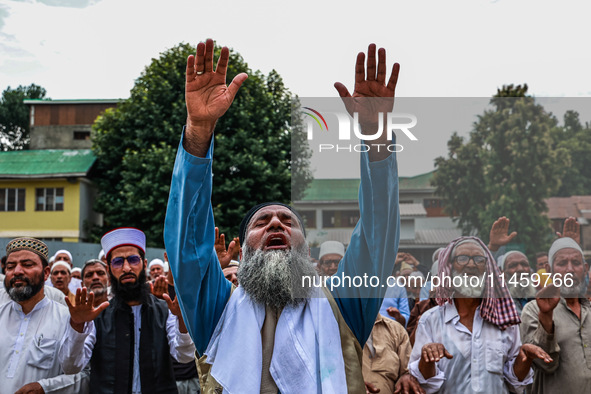 Muslim devotees are taking part in Salatul Istisqa in Sopore, Jammu and Kashmir, India, on August 7, 2024, to pray for an end to the dry hot...