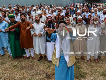 Muslim devotees are taking part in Salatul Istisqa in Sopore, Jammu and Kashmir, India, on August 7, 2024, to pray for an end to the dry hot...