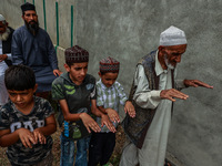 Muslim devotees are taking part in Salatul Istisqa in Sopore, Jammu and Kashmir, India, on August 7, 2024, to pray for an end to the dry hot...