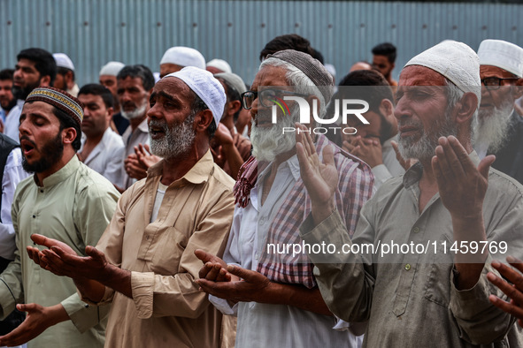 Muslim devotees are taking part in Salatul Istisqa in Sopore, Jammu and Kashmir, India, on August 7, 2024, to pray for an end to the dry hot...