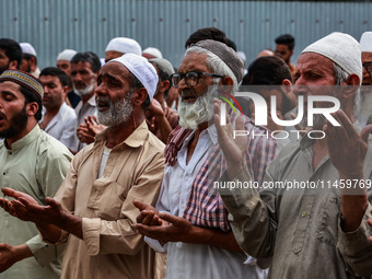 Muslim devotees are taking part in Salatul Istisqa in Sopore, Jammu and Kashmir, India, on August 7, 2024, to pray for an end to the dry hot...