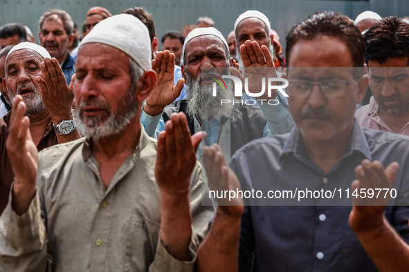 Muslim devotees are taking part in Salatul Istisqa in Sopore, Jammu and Kashmir, India, on August 7, 2024, to pray for an end to dry hot wea...