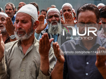 Muslim devotees are taking part in Salatul Istisqa in Sopore, Jammu and Kashmir, India, on August 7, 2024, to pray for an end to dry hot wea...