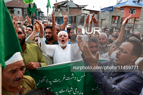 Muslim devotees are taking part in Salatul Istisqa in Sopore, Jammu and Kashmir, India, on August 7, 2024, to pray for an end to dry hot wea...