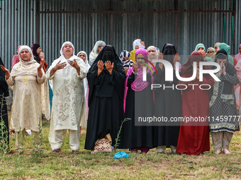 Kashmiri women are praying as Muslim devotees are taking part in Salatul Istisqa in Sopore, Jammu and Kashmir, India, on August 7, 2024, to...