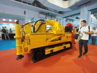 Visitors are visiting a ''Fully hydraulic deep-hole directional drilling rig for coal mines'' at the 2024 Beijing International Coal Mining...