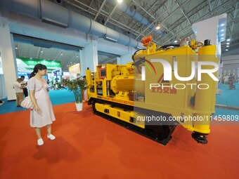 Visitors are visiting the ''crawler full hydraulic tunnel directional drilling Rig for coal Mines'' at the 2024 Beijing International Coal M...