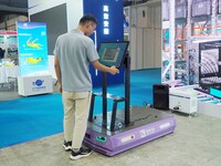 Visitors are experiencing the ''intelligent logistics warehousing and handling robot'' at the 2024 Beijing International Coal Mining Technol...