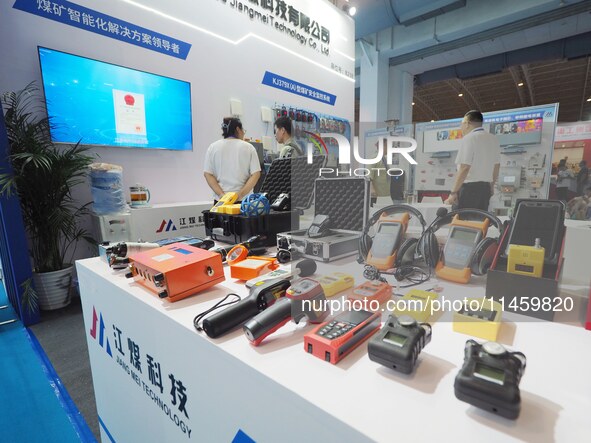 Visitors are visiting ''Coal Mine Safety Inspection Equipment'' at the 2024 Beijing International Coal Mining Technology and Equipment Exhib...