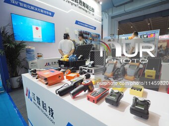 Visitors are visiting ''Coal Mine Safety Inspection Equipment'' at the 2024 Beijing International Coal Mining Technology and Equipment Exhib...